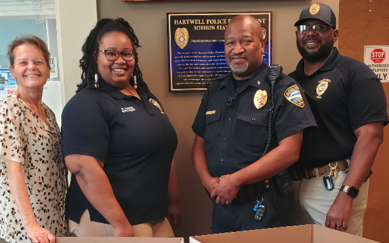 Hartwell Police employees stand next to the Toys for Tots collection boxes. Pictured above (from left to right): Renae Pierce, Roshunda Gaines, Lt. Darin Rucker, and Lt. Sherod Blackwell.
