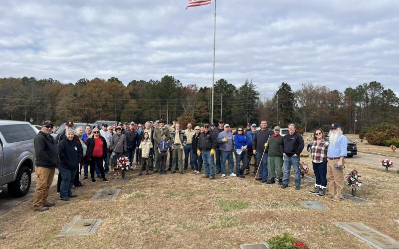 A group of volunteers gathered at Nancy Hart Cemetery Dec. 14 to participate in the nationwide Wreaths Across America event.