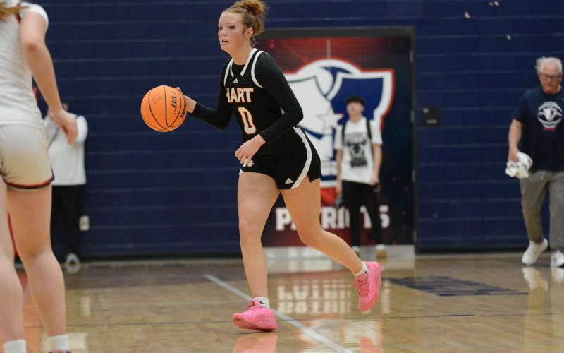 Senior guard Channing Segars dribbles the ball up the court for the Lady Dogs in the 48-42 loss to Powdersville.