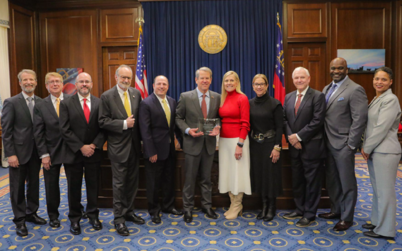 Governor Brian Kemp accepts the award for Georgian of the Year by the Georgia Association of Broadcasters.