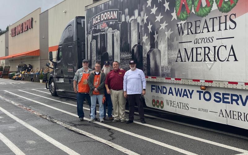 Pictured above (from left to right): Bobby Bowen, Sean Casey, George Herring, Eric McAllister, and volunteer truck driver Mr. Roy picked up the wreaths from Home Depot.