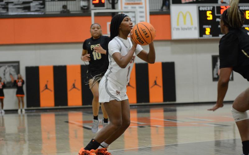 Sophmore guard Jaycee Wiley shoots a jumper in the win over Pendleton.