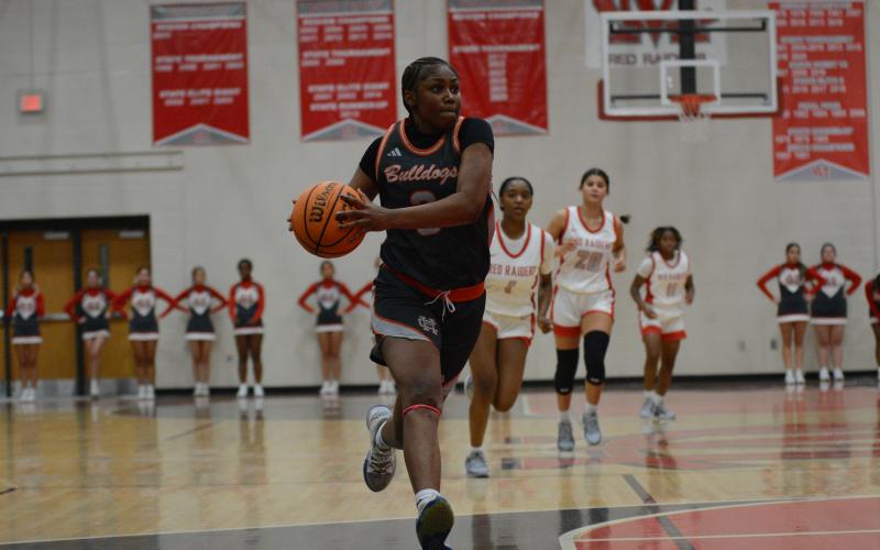 Junior guard Kiasia Montgomery (pictured) scores 31 points and senior guard TK Smith scores 36 points in the past two games to elevate the Lady Dogs to a 3-1 start.
