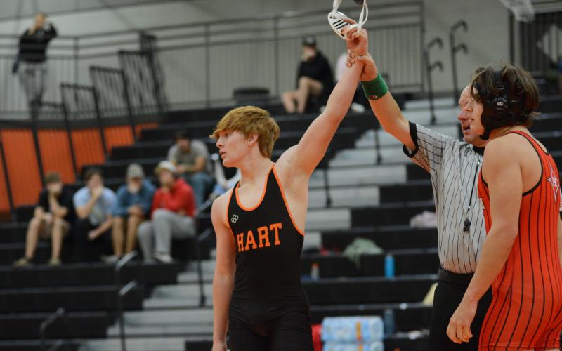 Pictured is sophomore Knox Pierce as he pins his opponent and claims victory in the 54-27 win over Stephens.