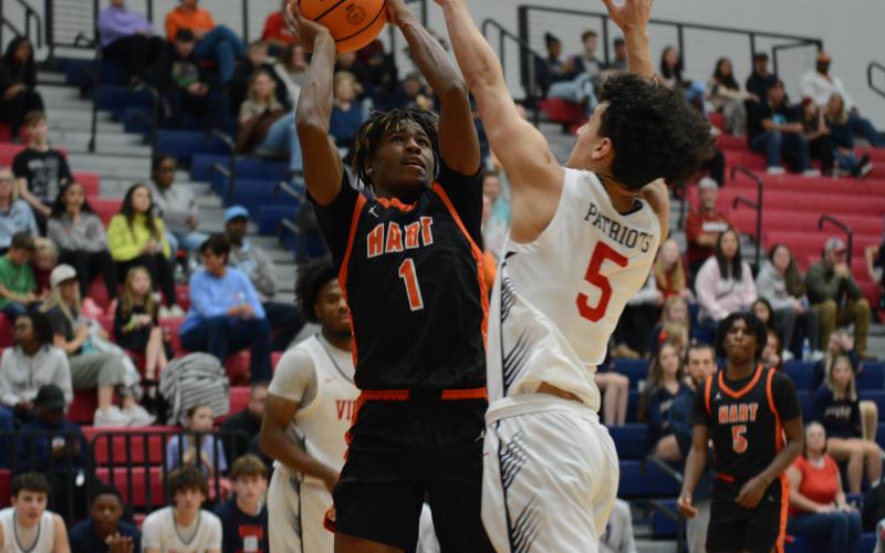 Sophomore guard Kurston Curry goes up for a contested shot.