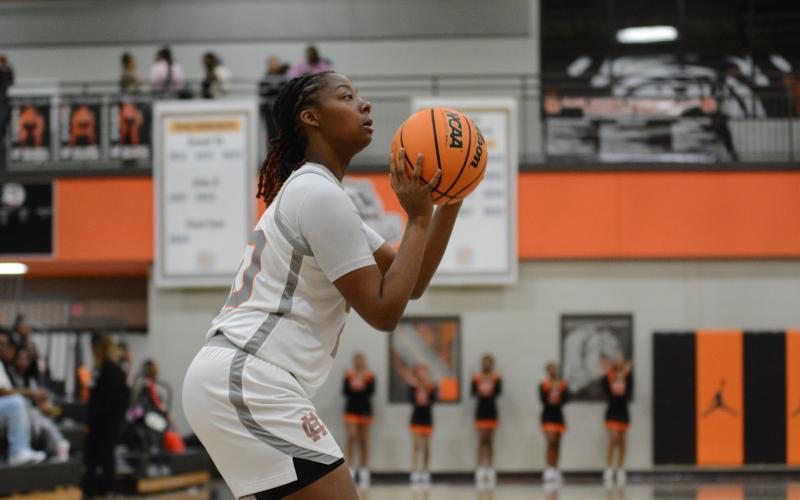 Sophomore forward Londen Durrett shoots a corner three against Pendleton.
