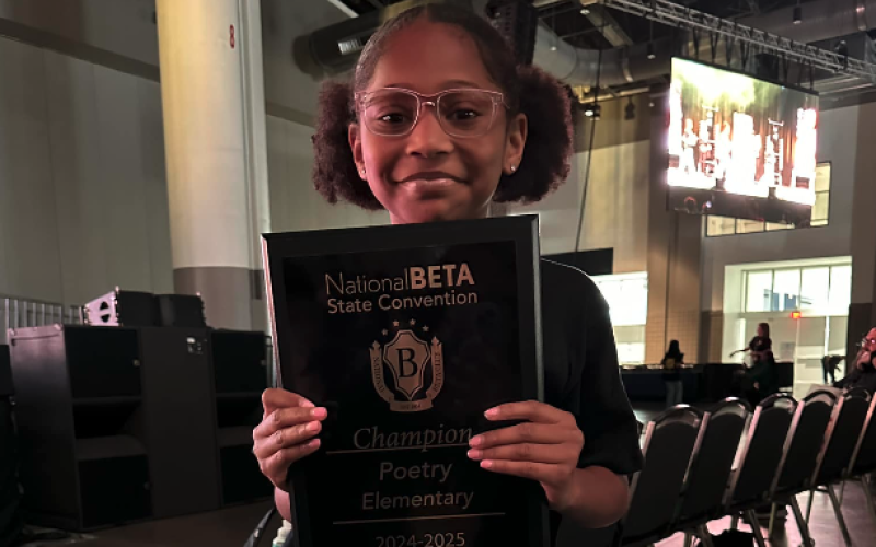 Fifth grader Cassidy Mitchell took home first place in the poetry competition during the National beta state convention.