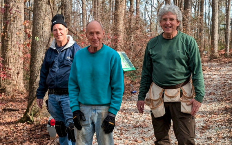 Woody Matthews, Doug Moore, and Ed Clark were members of the volunteer crew that built the Trex deck stretches in the page to protect some big tree roots.