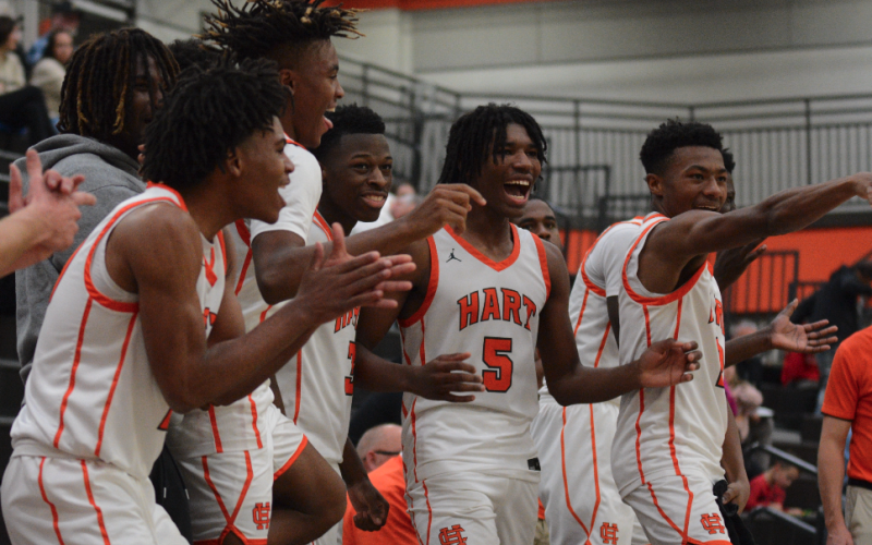 The Dogs bench celebrates after a big three late in 79-52 win over Pendleton as they would then go onto defeat Elbert County, 69-57 to win the McDonald’s Shootout Championship.