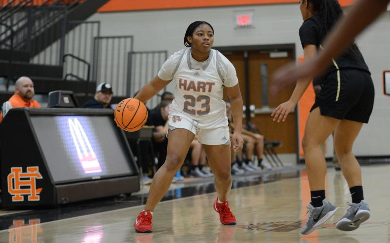 Senior guard TK Smith directs the offense in the win over Pendleton.
