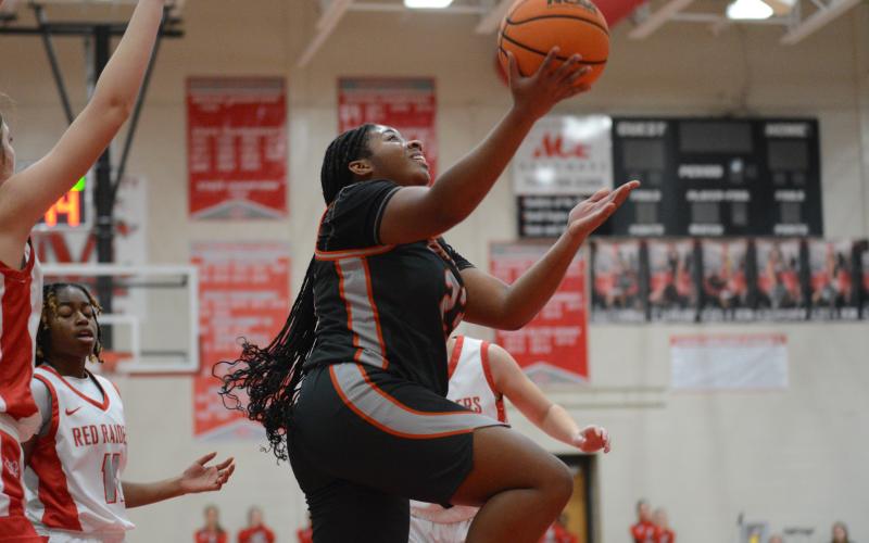 Junior guard Kiasia Montgomery scores 31 points and senior guard TK Smith (pictured) scores 36 points in the past two games to elevate the Lady Dogs to a 3-1 start.