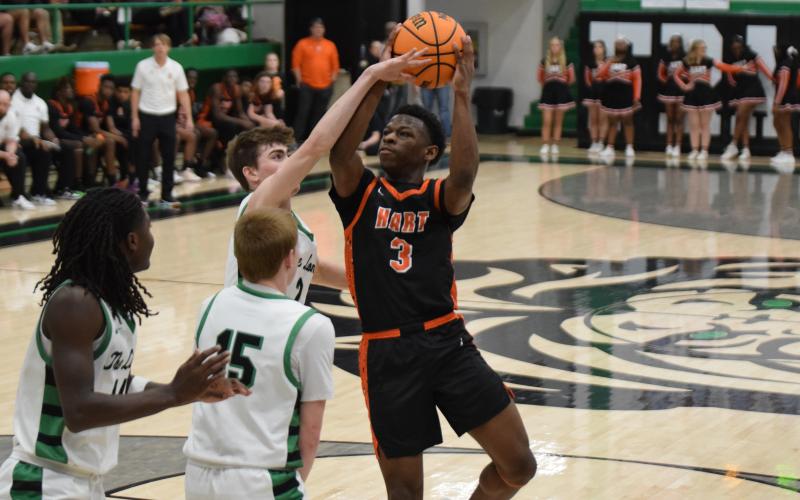 Senior guard Andrew Maxwell goes up for a contested shot in the 79-67 loss to Franklin County on Jan. 14. Photo by Shane Scoggins/Franklin County Citizen Leader.