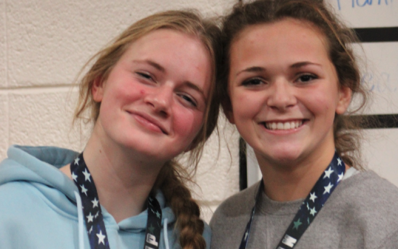 Two of the nine placers were junior Isla Bell (left) who placed second and senior Kailyn Bowers who placed first.