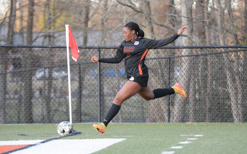 Sophomore defender Aidyn Craft sends a corner into play and later scored a goal as the Lady Dogs claimed a 11-1 win over the Lady Patriots of Westside Augusta on Feb. 21.