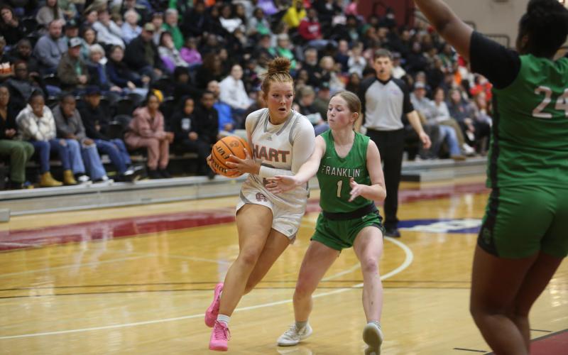 Senior guard Channing Segars drives to rim in the 57-46 win over Franklin County in the region semifinals.