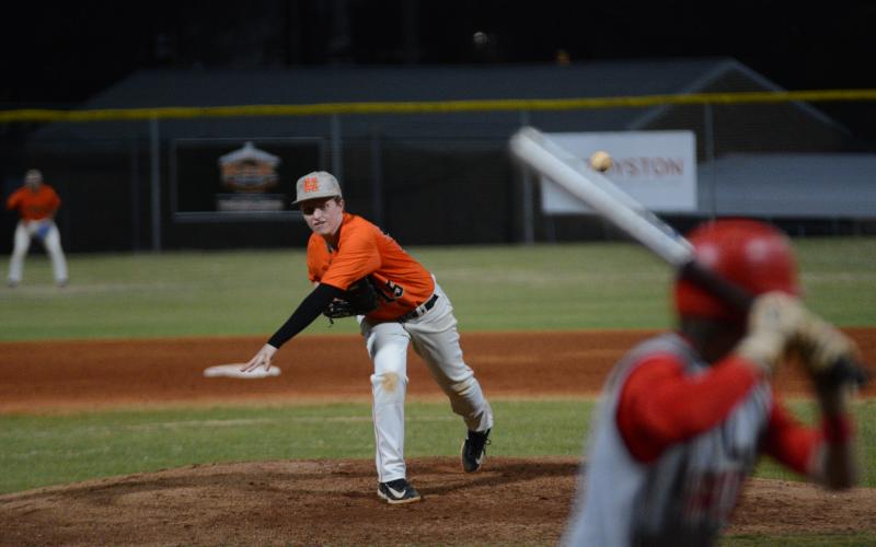 Sophomore pitcher Cole Ballard delivers the pitch as he pitched a complete game only allowing one run and punched out six against Madison County in the 2-1 win.