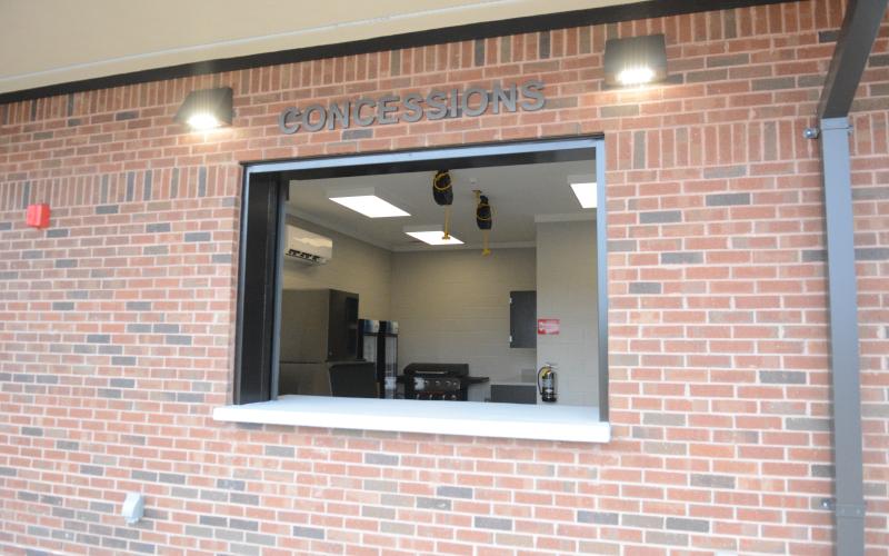 The new multipurpose athletic facility at Veterans Stadium (above) features a coaches office that faces the track/field, storage/equipment room for the track and middle school football team, a fully functioning concession stand, a hydration station and two locker rooms with bathrooms, a hydration station, lockers and benches in each room. Both locker rooms can hold up to 160 athletes.