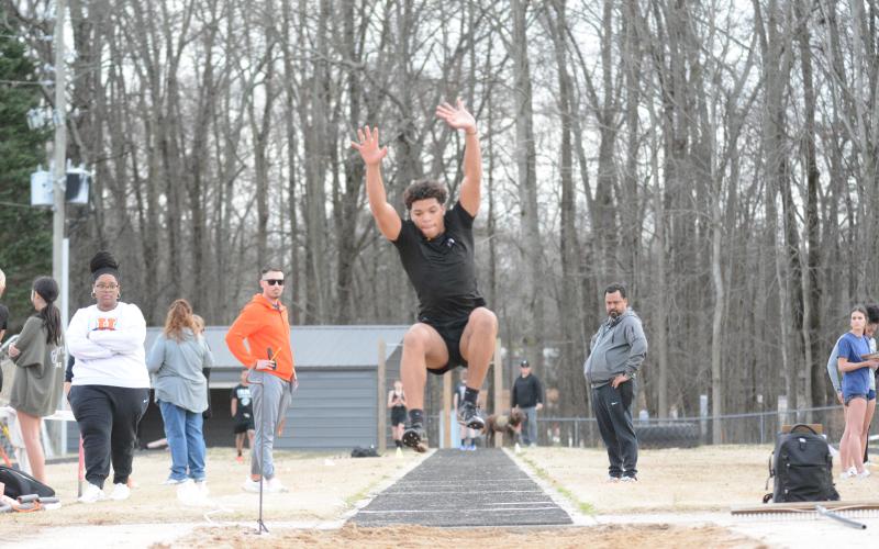 Junior Devin Blakely places fourth in the triple jump Feb. 22.