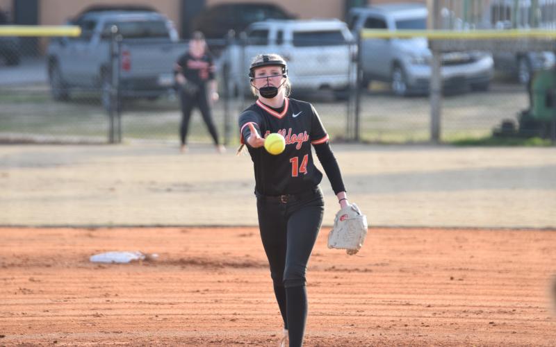 Junior Emma Mitchell delivers the pitch in the 2-0 loss to Franklin County on Feb. 18. Photo by Shane Scoggins/Franklin County Citizen Leader