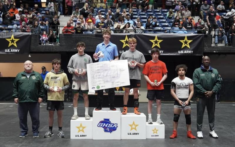 Senior Harrison Krause (fourth from the left) finishes as a state runner up at the state traditional meet in Macon on Feb. 13-14.