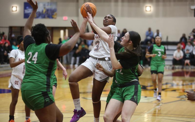 Junior forward Kiasia Montgomery led the way for the Lady Dogs as she scored 25 points against the Lady Lions of Franklin County to advance to the Region 8-AA Championship.