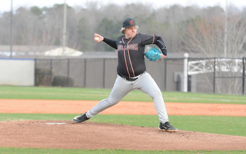 Sophomore pitcher Landry Carter winds up to pitch as he pitched two innings allowed one earned run and punched out four batters in the 6-5 win over Jefferson.