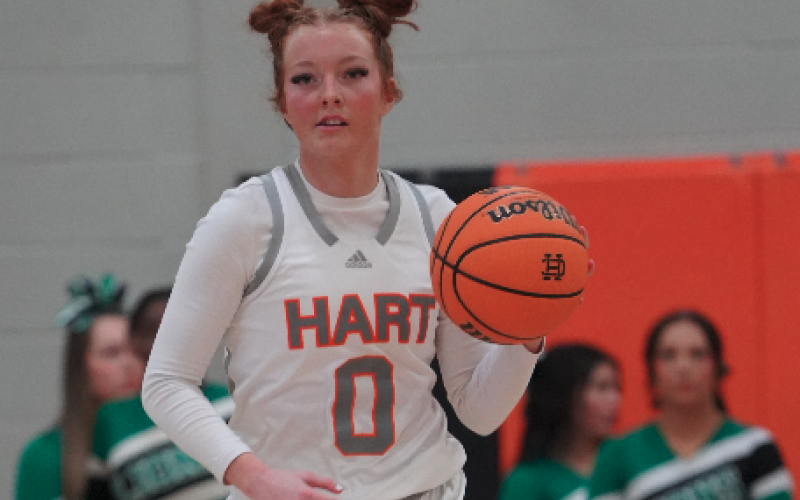 Senior guard Channing Segars dribbles the ball across the timeline in the 54-38 win over Franklin County. Photo submitted by DJ Groves.