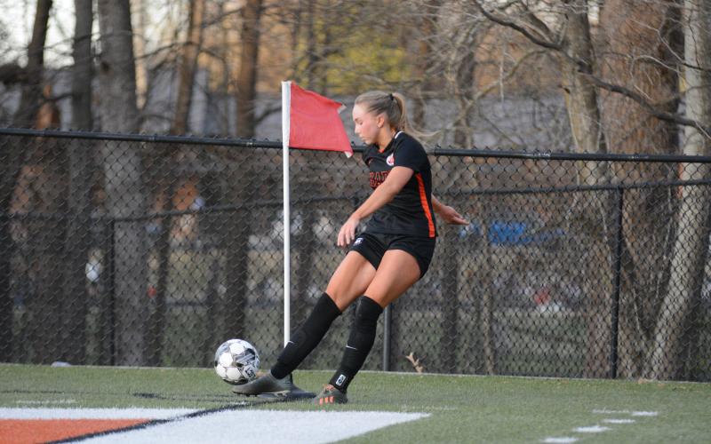 Teague Pierce delivers the corner kick into play in the 8-0 win over Banks County Feb. 13.