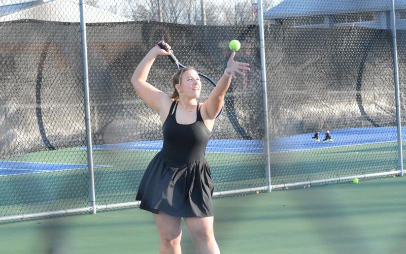 Adah Grace Johnson prepares to serve in the 5-0 loss to Stephens County on Feb. 27.