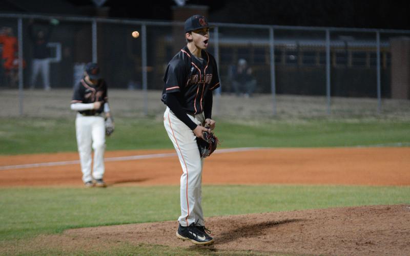 Freshman pitcher Aiden Kennedy celebrates after the final out in the 4-3 win over the Warriors of Oconee County.