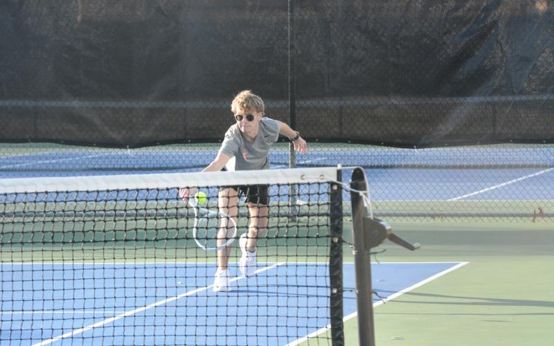 Ayden Mercer returns a serve in the 5-0 loss to Stephens.