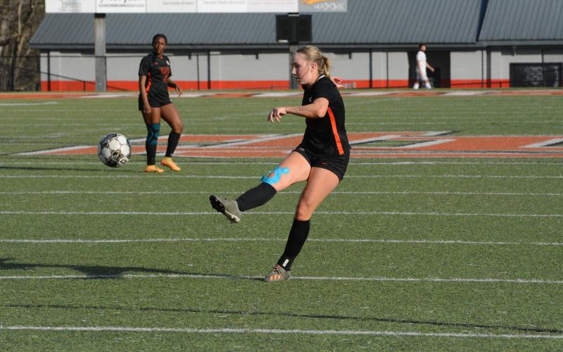 Senior midfielder Teague Pierce pops in a goal from long range in the 10-0 win over the Lady Rams of Monsignor Donovan on March 14. (Photo/Benjamin London)