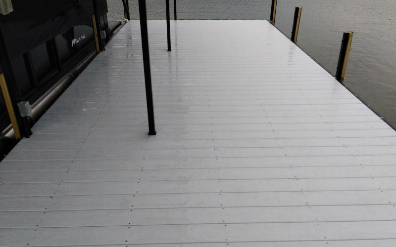 Doug Mackney’s Quality Work Service offers home renovation services like deck work and dock work. Mackney said a new trend in dock work includes using composite boards that require less maintenance and last longer than wooden docks. (Photo submitted by Doug Mackney)