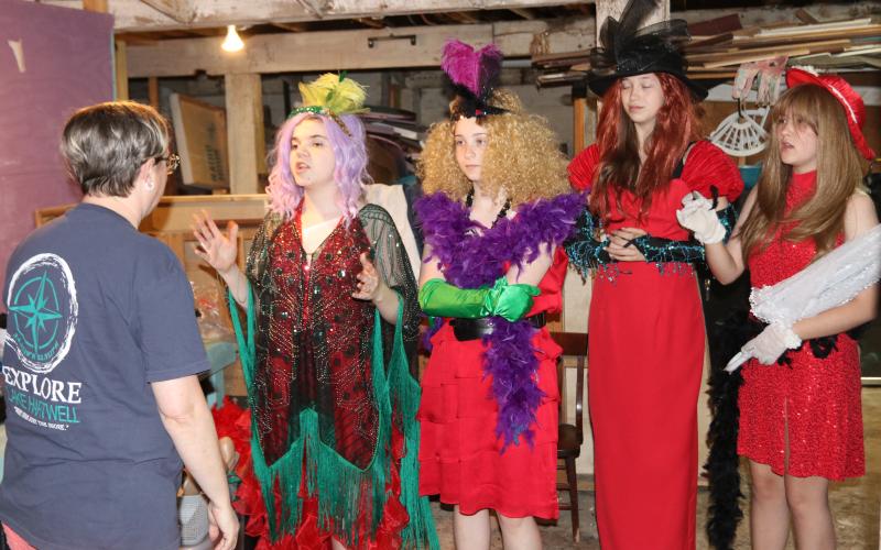 Lani Sessoms, Hart County Community Theatre president, (far left) speaks to Hart County High School students (L-R) Ryley Hill, Kelley Rosage, Kaylee Dutton and Deborah Ingram about costume choices at Backstage Experience Day April 25. The group of students got to design their own Miss Argentina costumes as practice for the Hart County Community Theatre’s upcoming “Beetlejuice Junior” performances June 7. (Photo/Adriana Cascio)