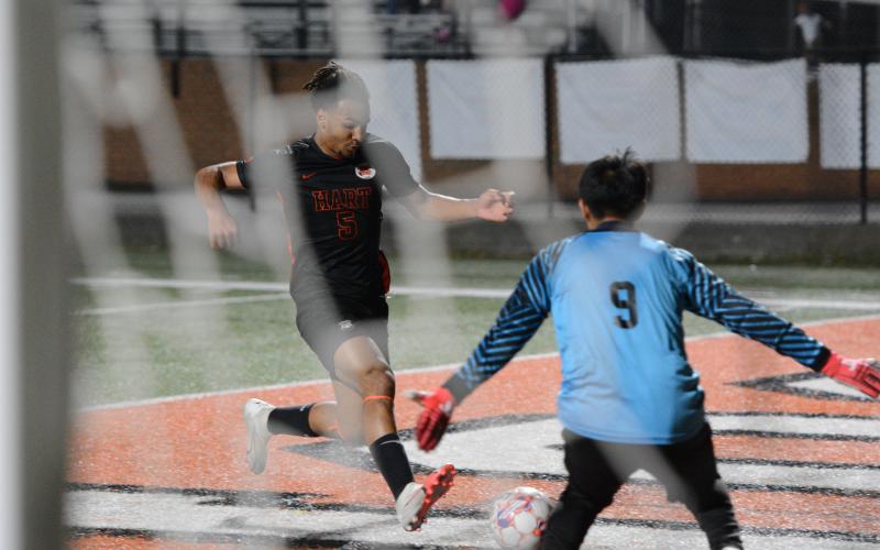 Elijah Garnett takes a shot on goal from earlier in the season. (Photo/Benjamin London)