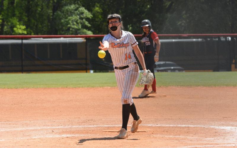 Junior pitcher Emma Mitchell delivers the pitch in the 14-4 loss to Haralson County. (Photo/Benjmain London)