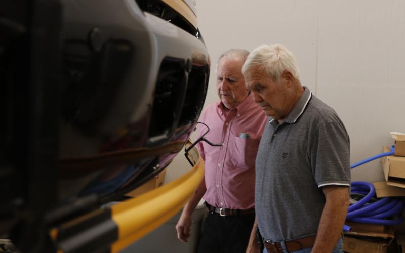 Pictured (L-R) are community members Ed Cleveland and David Fleming. (Photo/Adriana Cascio)