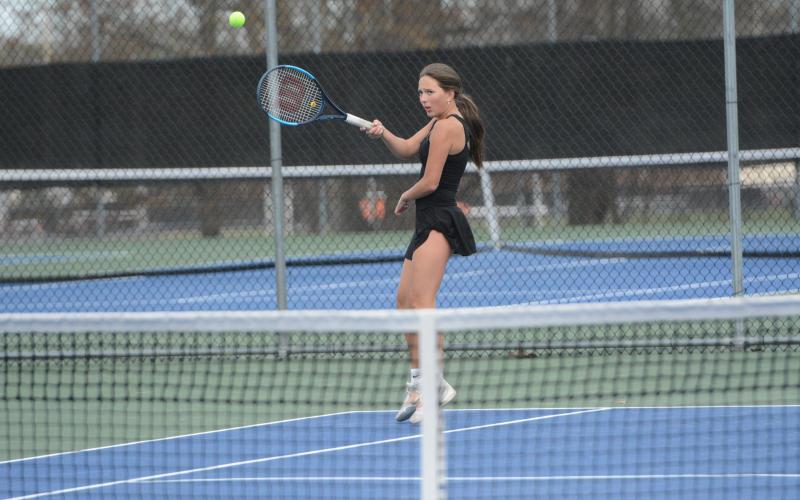 Gabby Bernazky returns a serve in the 5-0 loss to Prince Avenue Christian. (Photo/Benjamin London)
