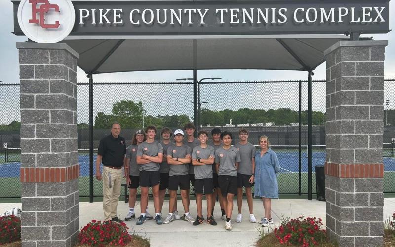 Pictured is the Hart County High School boys tennis team as they celebrate after their 3-0 win over No. 9 seed Pike County and advance to the Sweet Sixteen. (Photo submitted by Hart County High School)