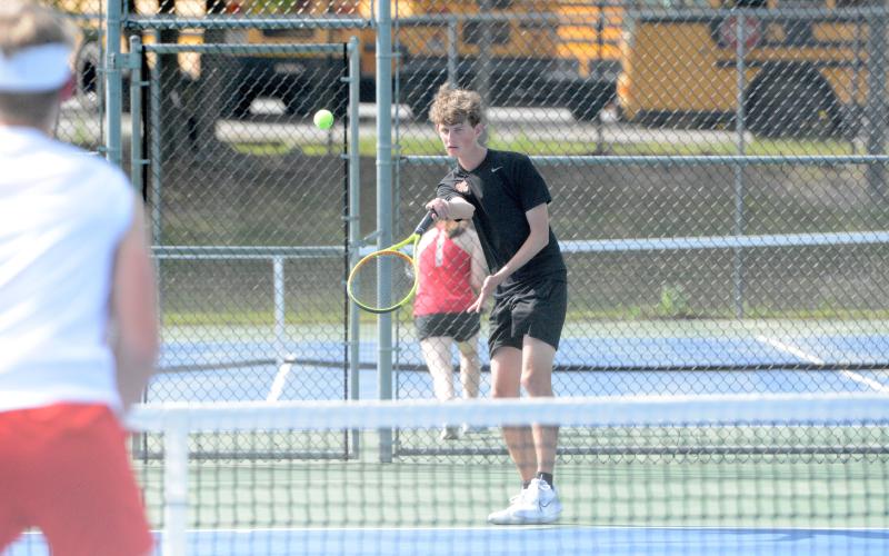 Jackson Dainel picked up a win at No. 2 singles, 6-3, 3-6 and 10-7 to elevate the Dogs to a 3-2 win over the Red Raiders of Madison County on April 3. (Photo/Benjamin London)