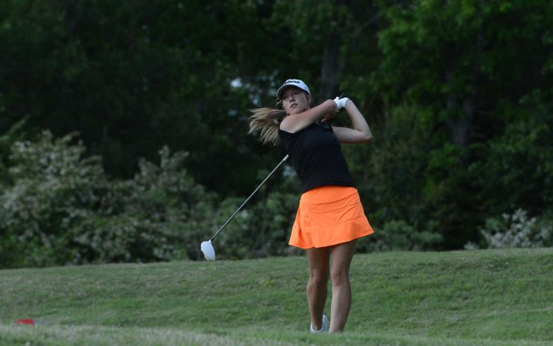 Senior Kylie Osborne teeing off on Hole 12 as she shot a 103. (Photo/Benjamin London)