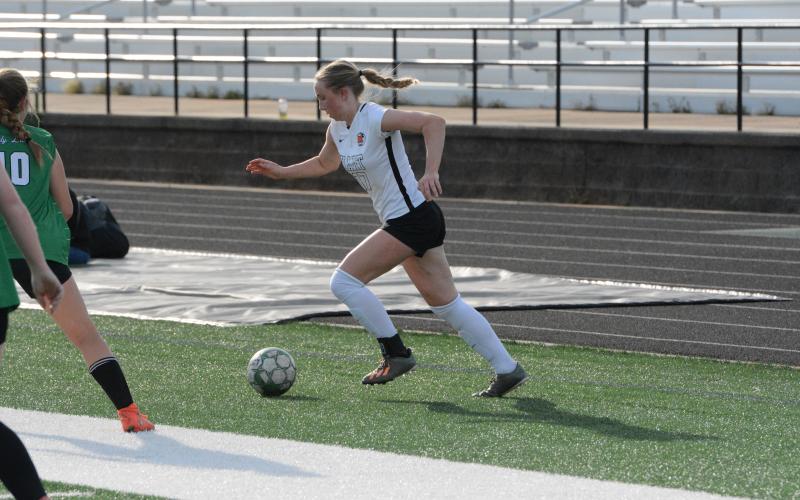 Midfielder Teague Pierce nets the lone goal in the 5-1 loss to Franklin County on March 28. (Photo/Benjamin London)