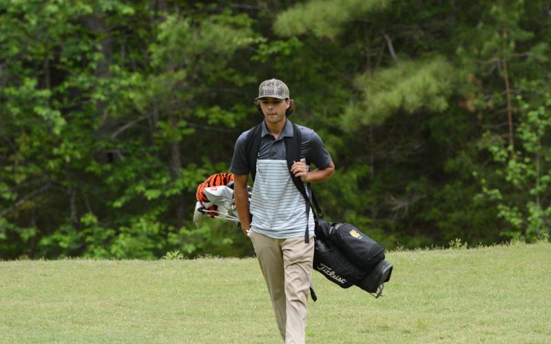 Senior Tucker Oglesby coming off of Hole 14 as he had a birdie on Hole 1 to help the Dogs win on the playoff hole. (Photo/Benjamin London)