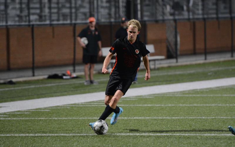 Will Bell scores the lone goal in the 3-1 loss to the Blue Devils of Elbert County on April 15. (Photo/Benjamin London)