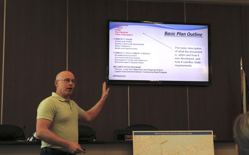Adam Hazell, Georgia Mountains Regional Commission planning director, discusses the basics of a comprehensive plan during the public hearing Tuesday. A second public input session will be held May 20 at 6 p.m. at city hall. (Photo/Adriana Cascio)
