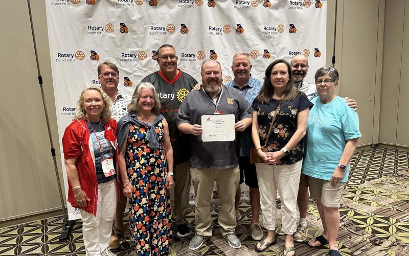 The club was named the District 6910 2024-2025 Club of the Year Runner-Up. Club members pictured with the award include (front row, L-R) Joni Ingram, Debbie Kulcsar, Jason Ford, Rebecca Metzger and Nancy Butler; (back row, L-R) Jeff Loggins, Georgia District Governor Bobby Hildreth, Mike Everett and Brian Metzger. (Photo submitted by Rotary Club of Hartwell)