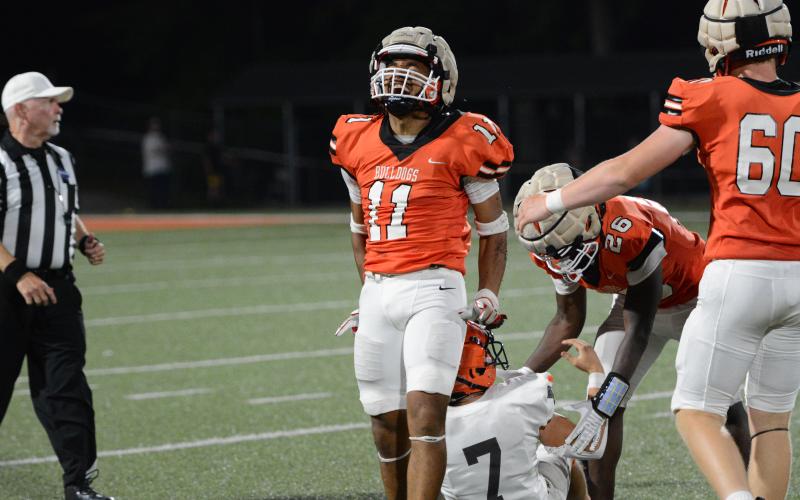 Rising senior linebacker Elijah Garnett celebrates after sacking the quarterback in the 24-7 win over Habersham May 16. (Photo/Benjamin London)
