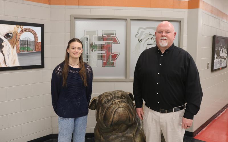 Senior Zoe Carter (left) was honored by State School Superintendent Richard Woods as a Georgia Scholar in April. In January, Carter was recognized as the 2025 STAR Student, alongside her STAR Teacher Mike Edwards (right).