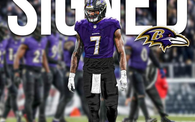Kaimon Rucker signs with the Baltimore Ravens on May 13. (Submitted by Jordan Lay)