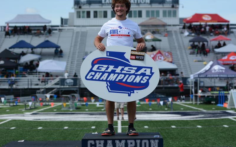 Junior pole vaulter Luke Samples captures back-to-back state titles after clearing 16’6” at the state meet on May 9. (Photo/Benjamin London)